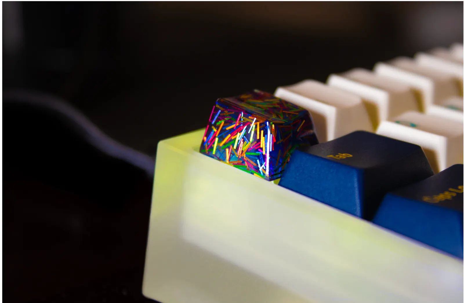 Close-up of a colorful custom keycap on a mechanical keyboard